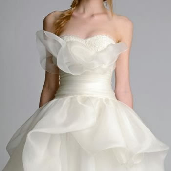 Organza bodice with a large fabric flower and a full skirt