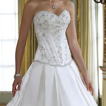 Beaded sweetheart corset bodice over a full skirt