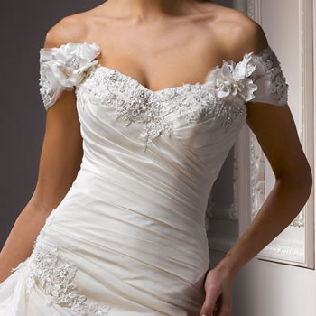 Off-the-shoulder neckline with beaded lace